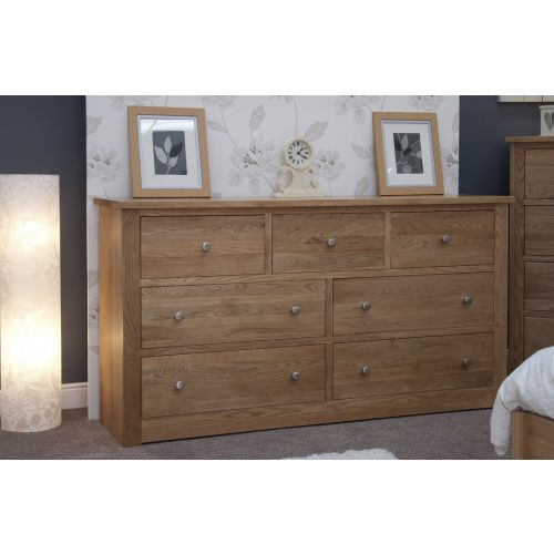 Torino Solid Oak 7 Drawer Wide Chest of Drawers.